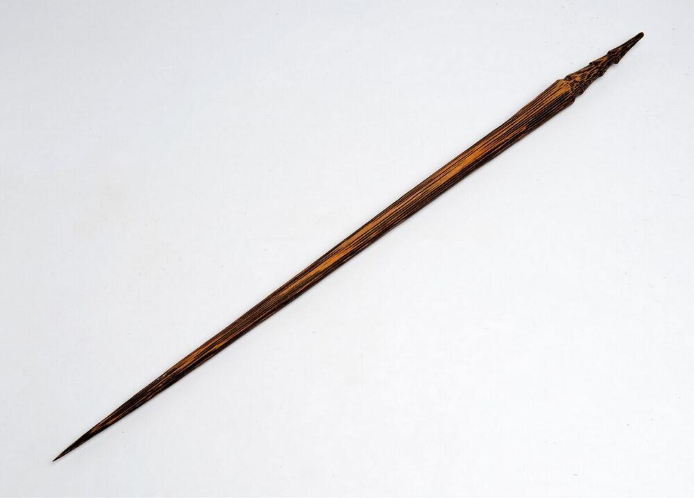 Pen van niboengpalmhout voor het doorsteken van het neustussenschot