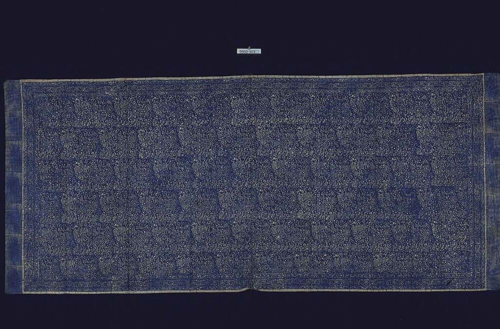 Katoenen schouderdoek met vleugelmotieven en bloemen