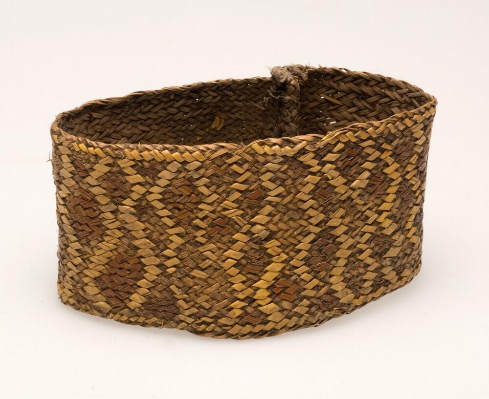 Gevlochten bovenarmband