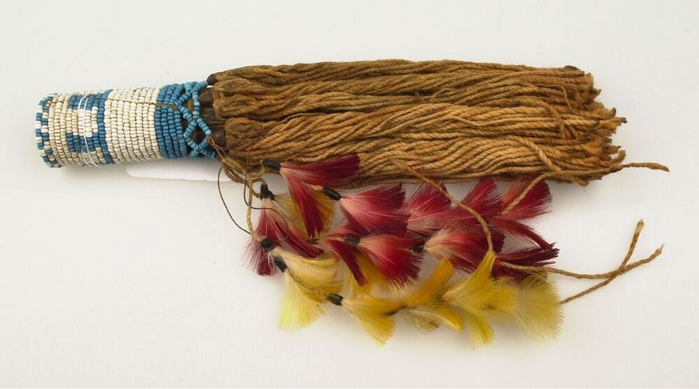 Bamboo hair cylinder with beads, strings and feathers