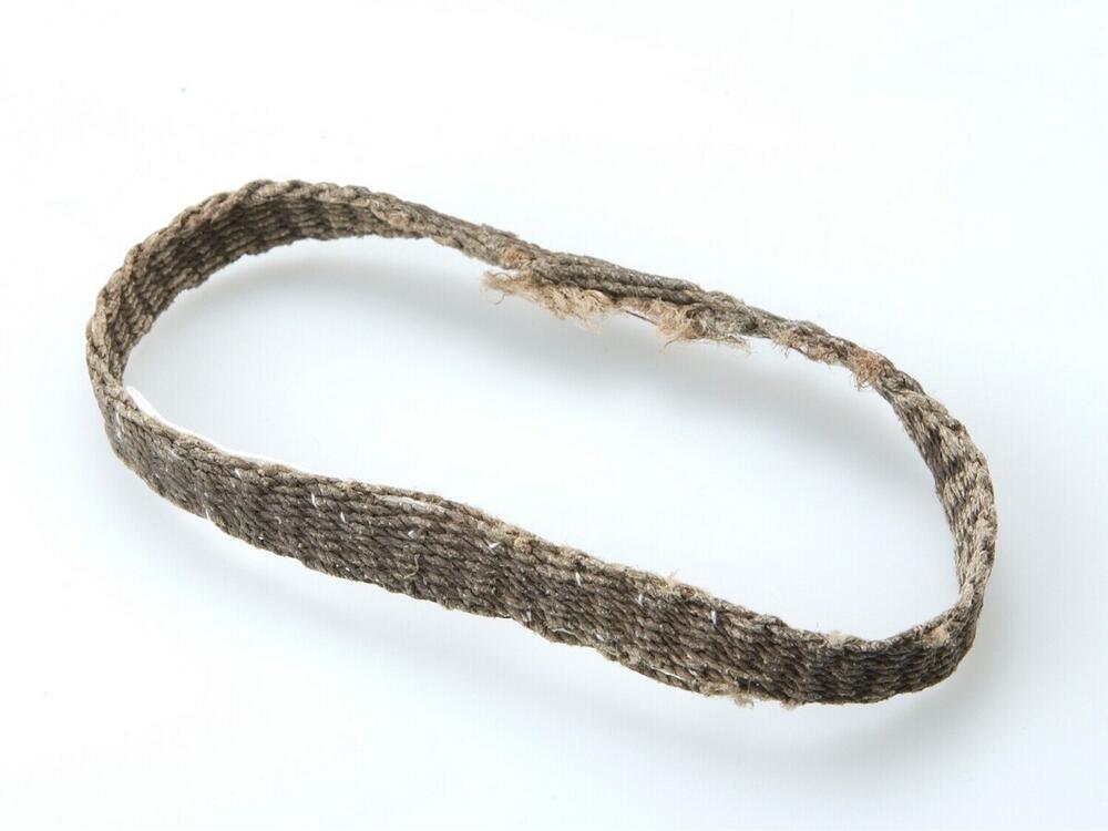 Geweven knie- of enkelband van plantaardige vezel