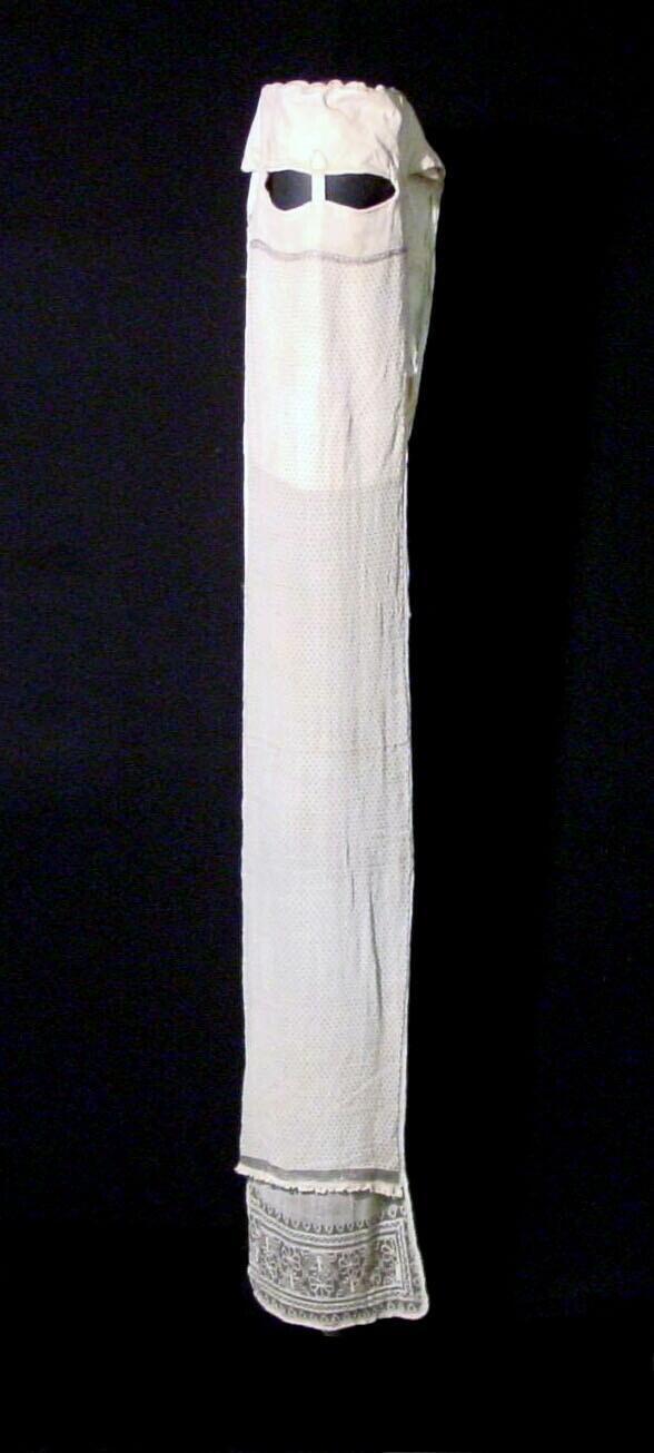 Face veil, part of a costume for a Muslim woman who has made the pilgrimage to Mecca