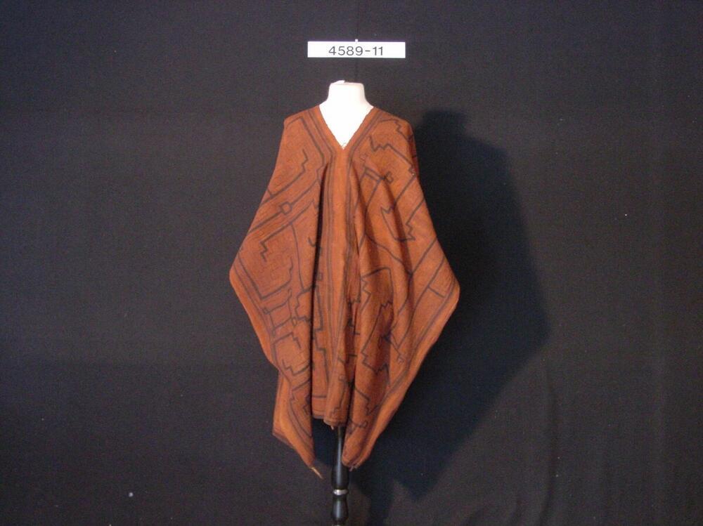 Beschilderde katoenen poncho, gedragen door mannen