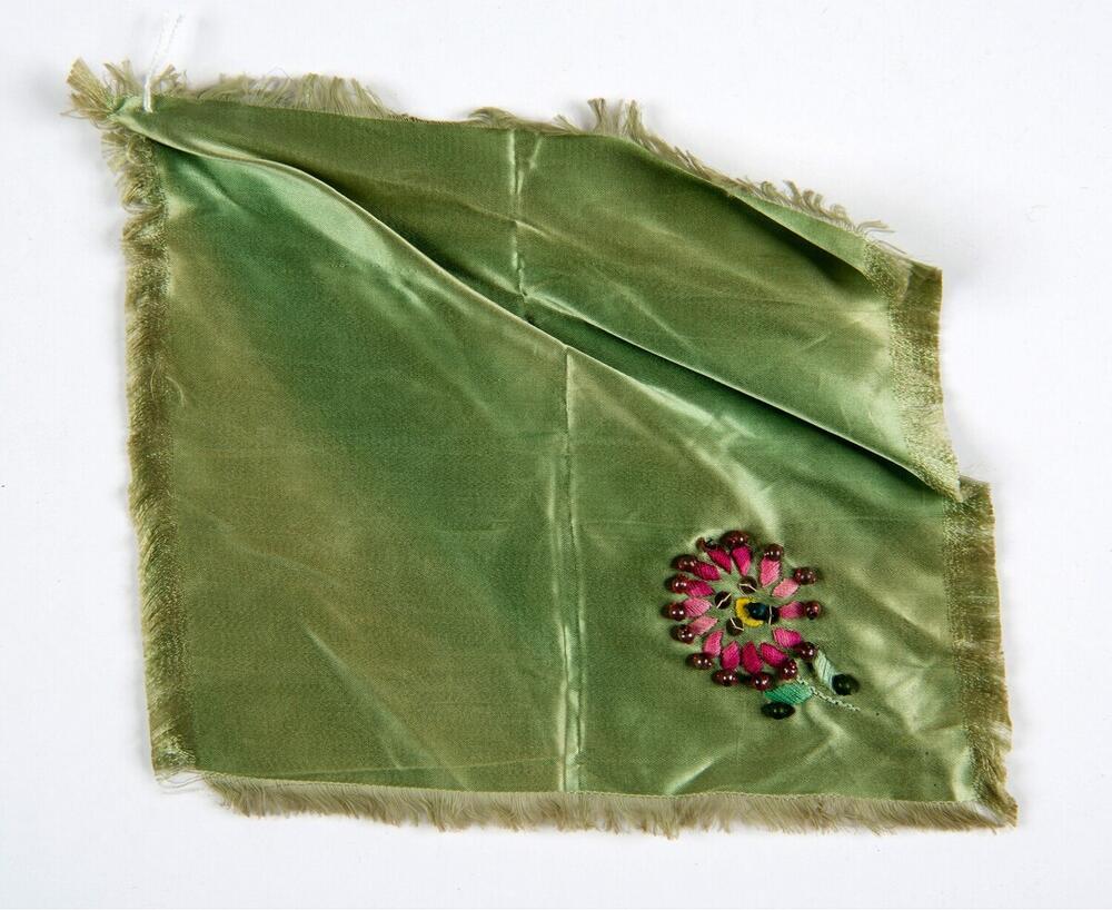 Groene zakdoek van een 'Negrito'-danskostuum
