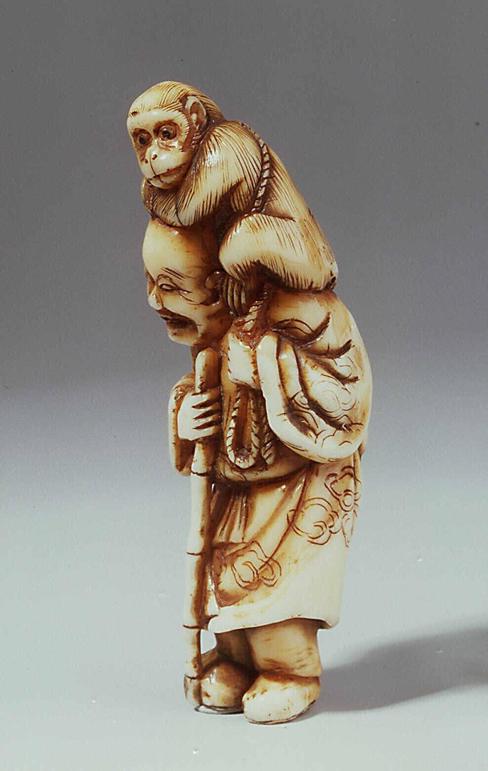 Netsuke: monkey trainer