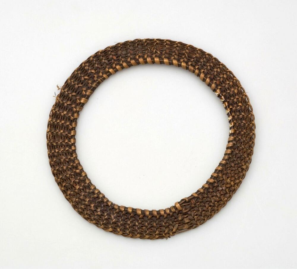 Gevlochten rotan mannenbovenarmband