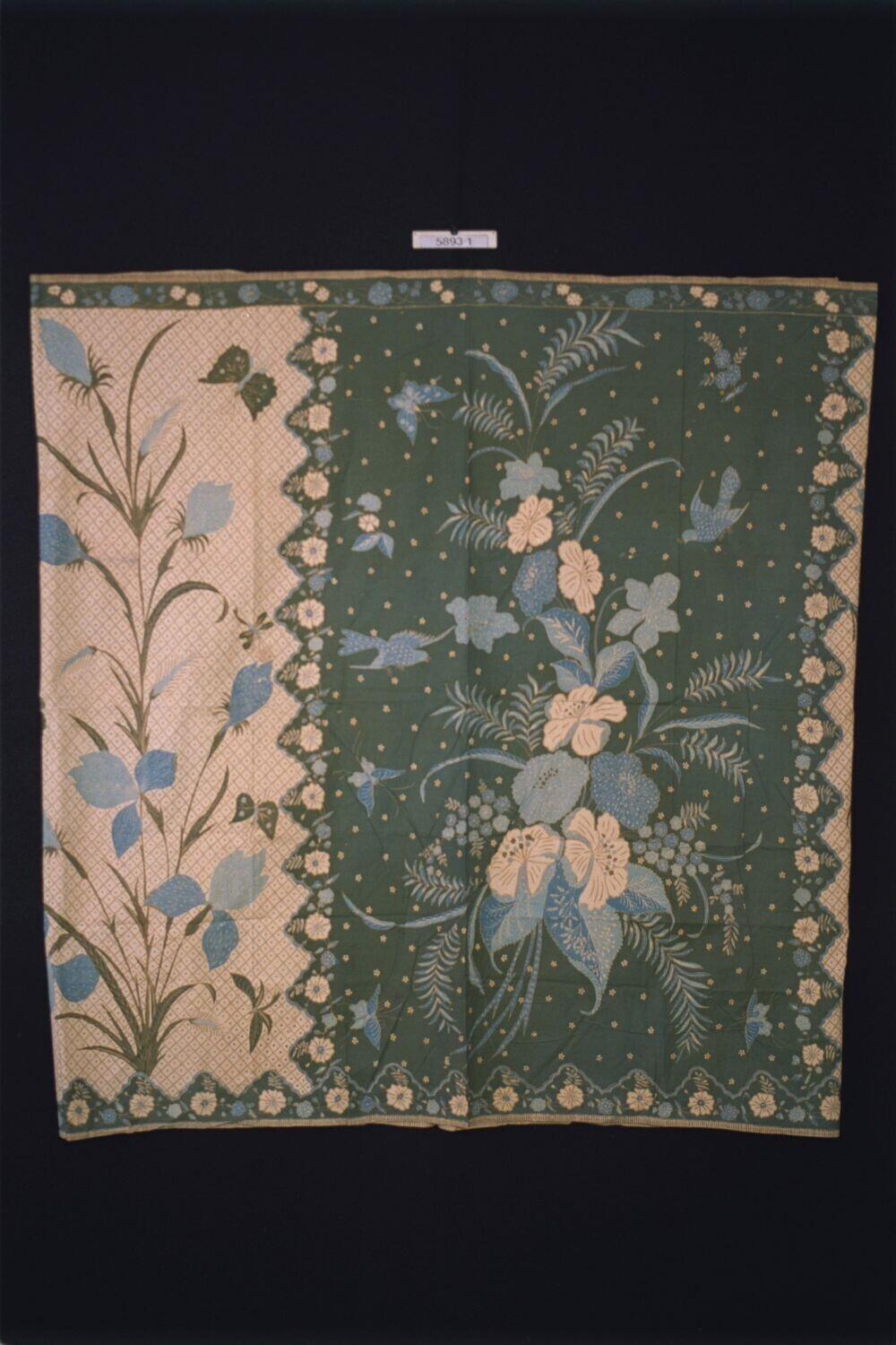 Kokerrok met geometrisch patroon en florale motieven