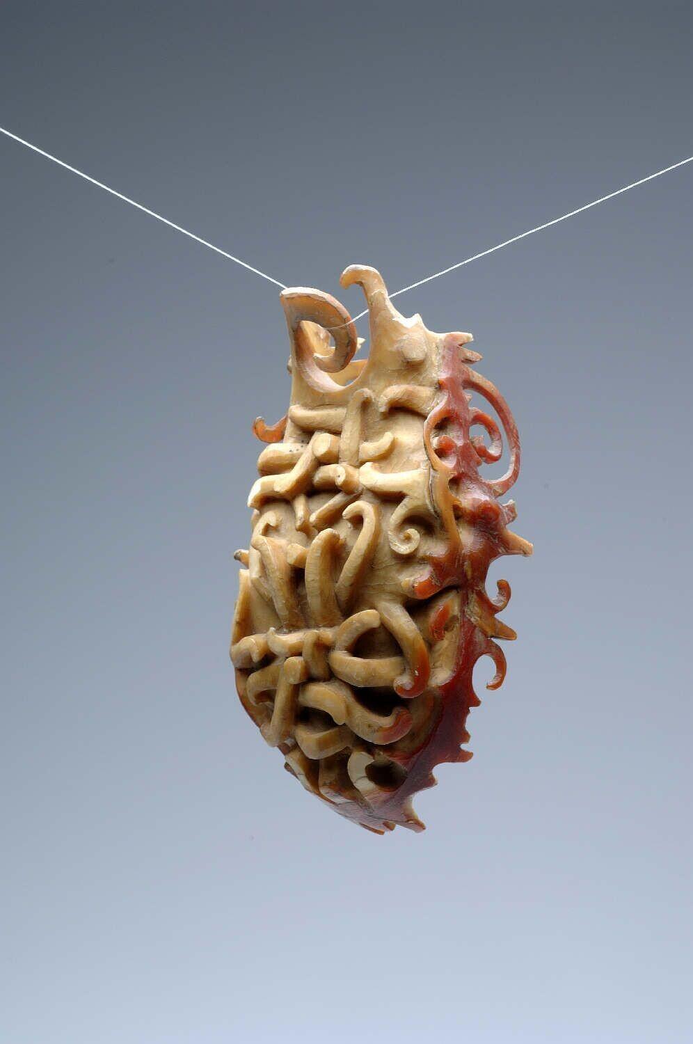 Earring made of hornbill beak