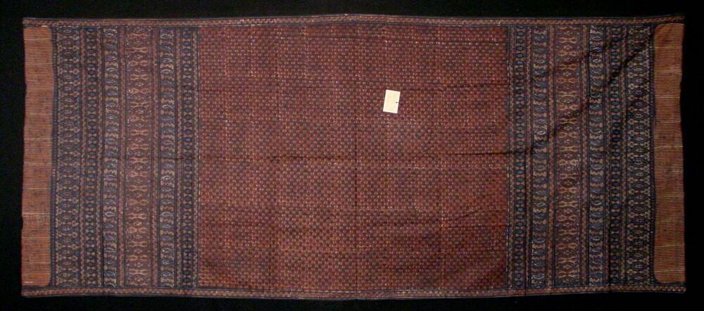 Schouderdoek, versierd met stempelbatik