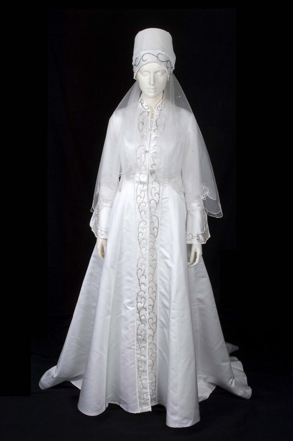 White jacket with strass, part of a bridal gown