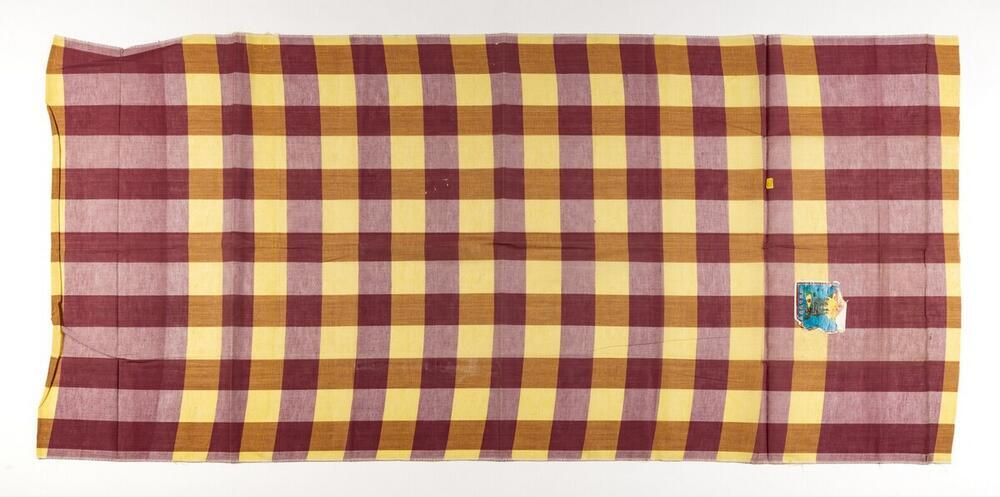 Een katoenen doek gebruikt door mannen voor verschillende doeleinden.