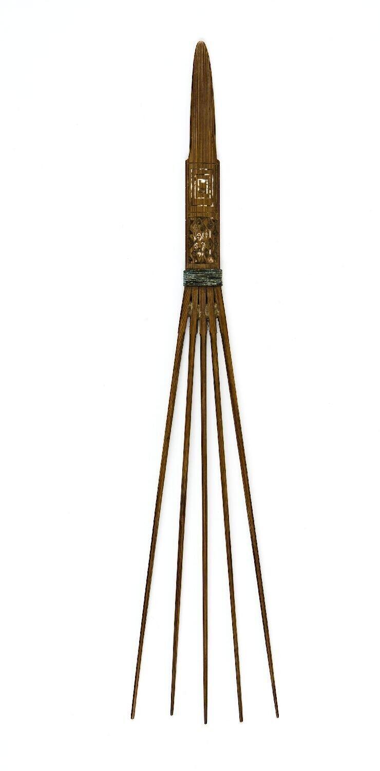 Decorative comb, worn as a hair adornment