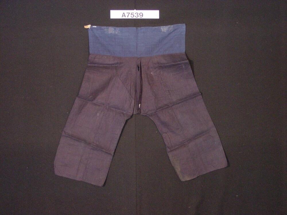 Broek van donkerblauw katoen met wijde pijpen