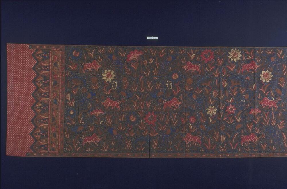 Wikkelrok met olifanten, steltlopers, lotusbloemen en karbouwen