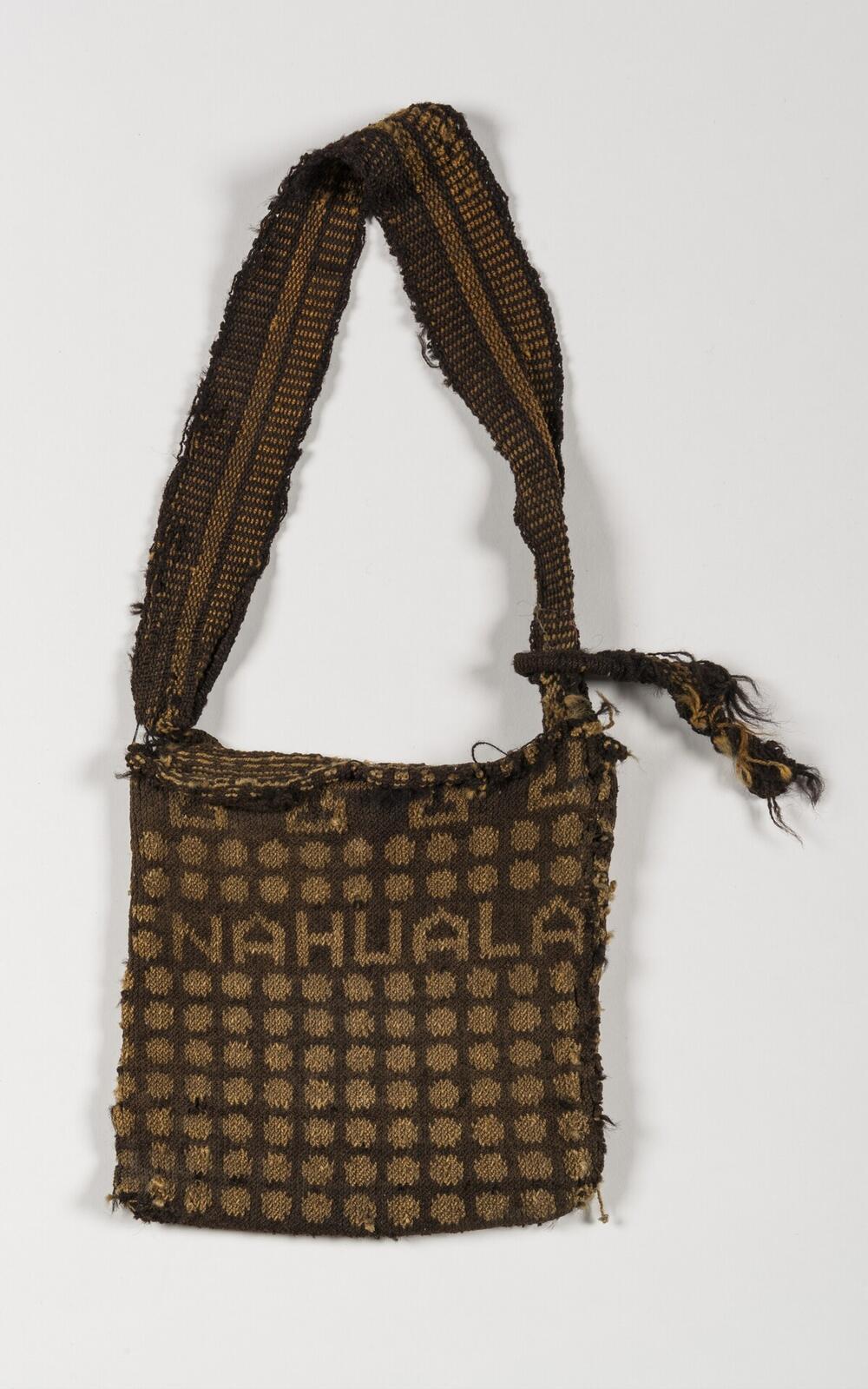 Schoudertas met tekst 'NAHUALA'