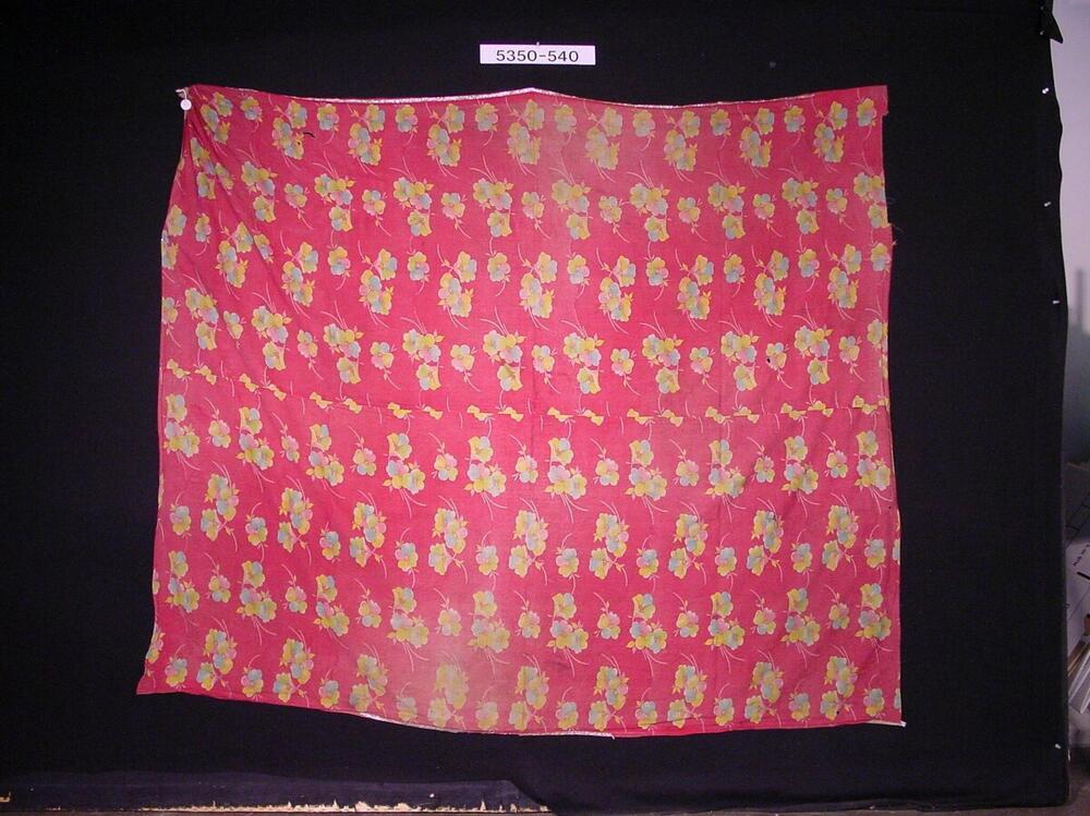 Paars rode hoofddoek met bloemen in geel en groen