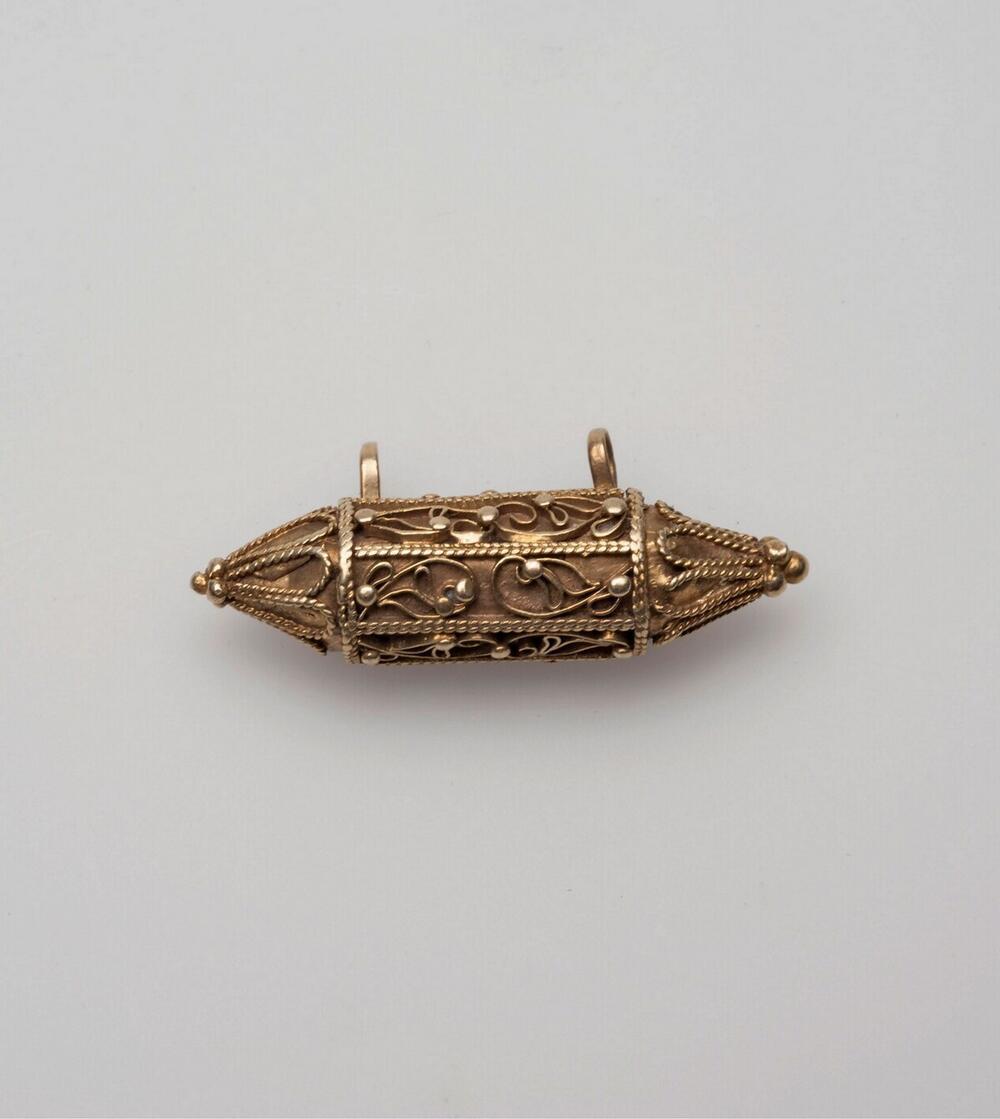 Losse gouden hanger behorend bij een halsketting