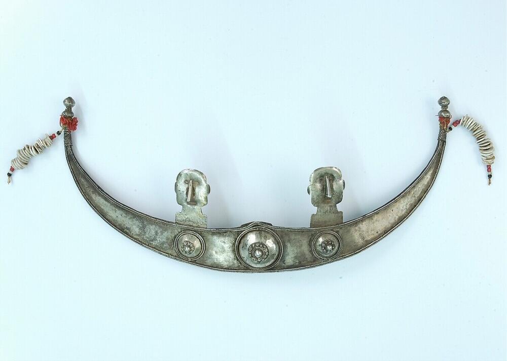 Silver head ornament