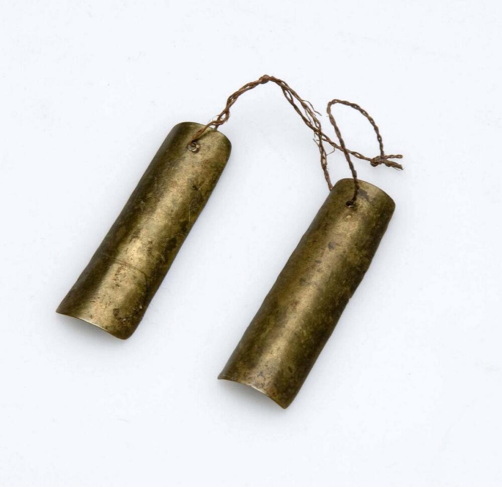 Copper ear decoration made of a cartridge