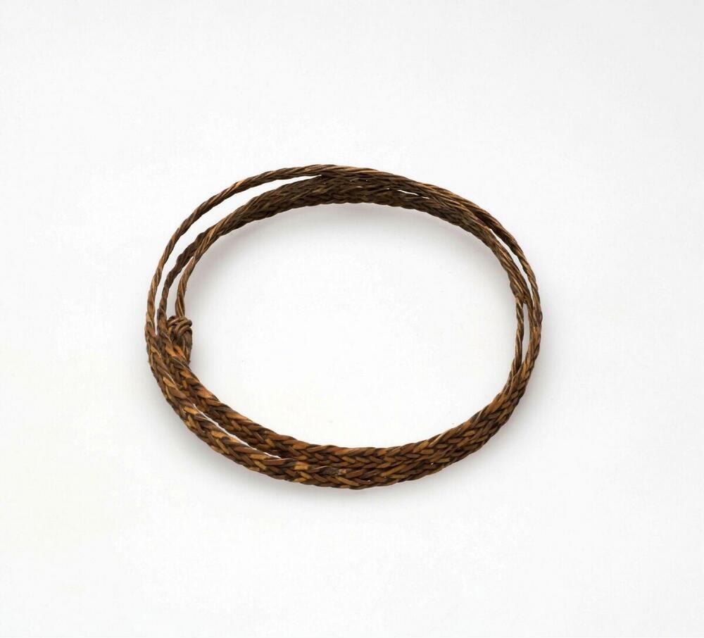 Gevlochten rotan bovenarmband