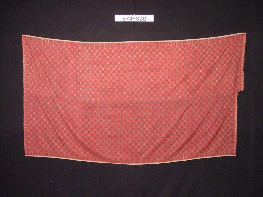 Zijden sarong versierd met ornament van gouddraad