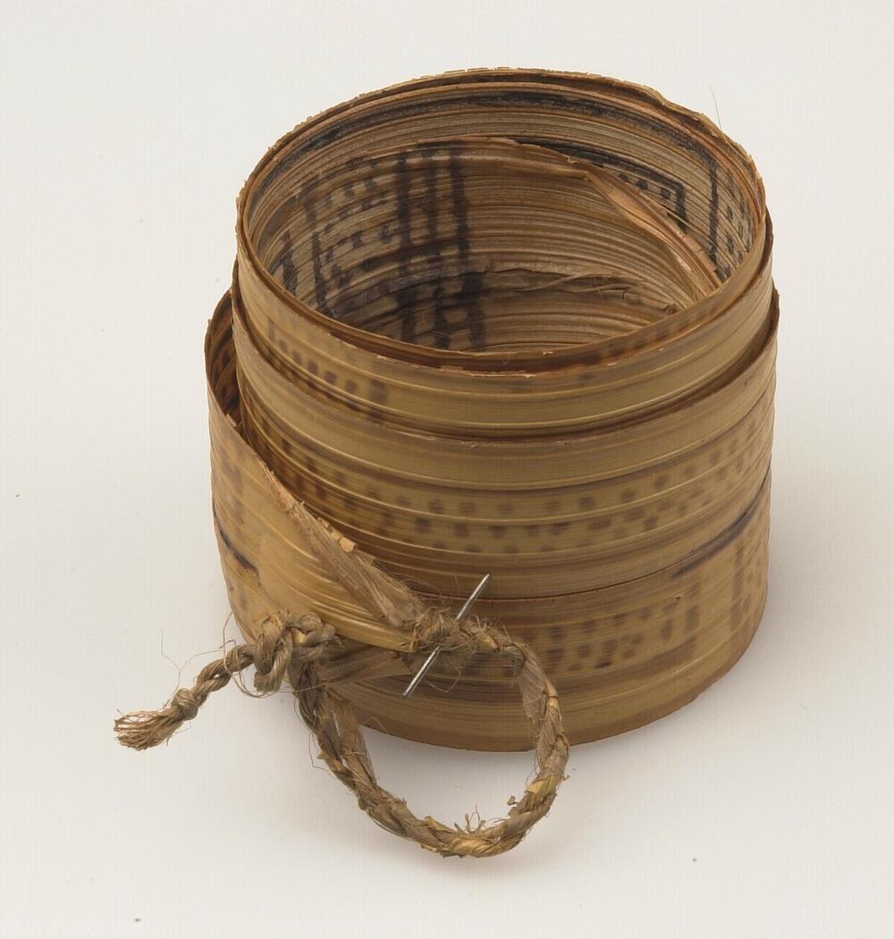 Upper arm decoration made of palm leaf