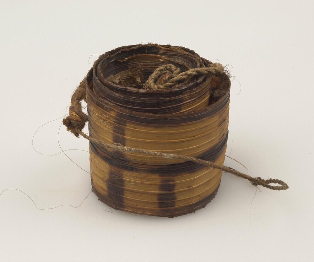 Upper arm decoration made of palm leaf