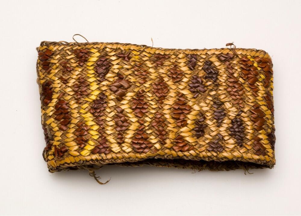 Gevlochten bovenarmband