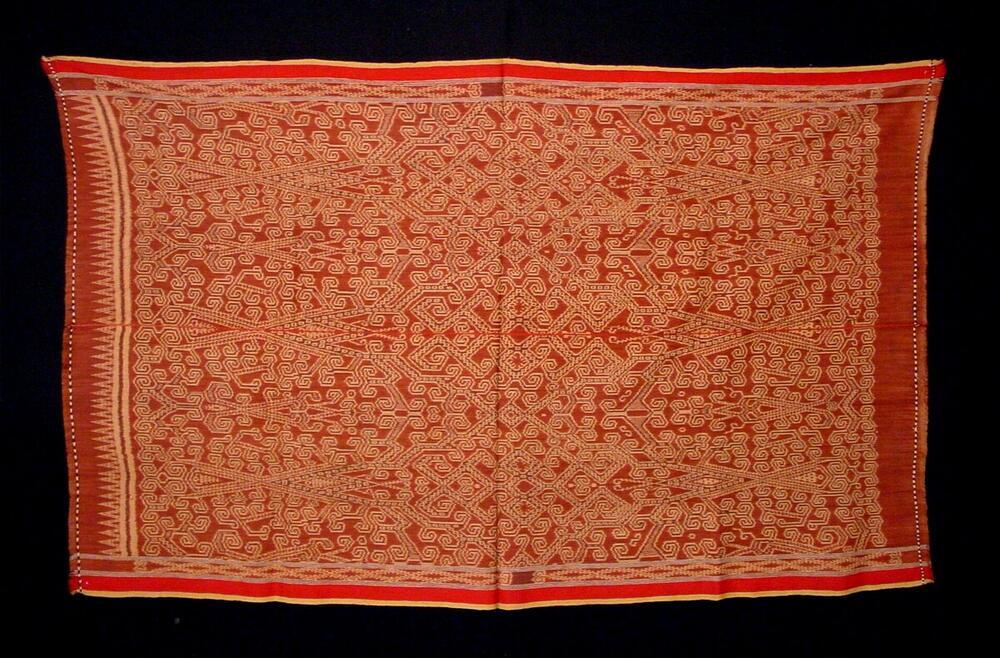 Katoenen doek met krulpatroon in scheringikat
