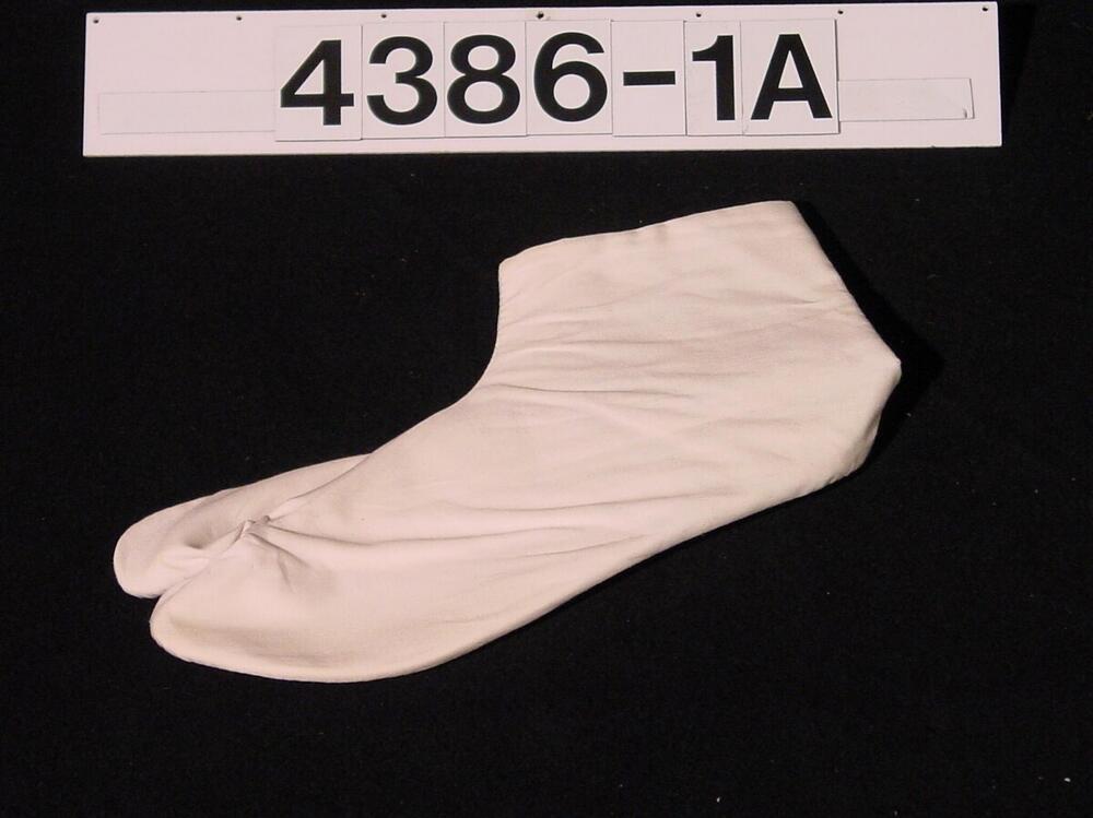 Witte sok met aparte grote teen