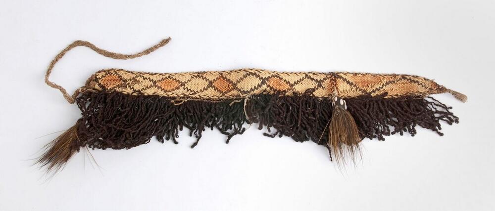 Girdle of plaited fibers, decorated with human hair