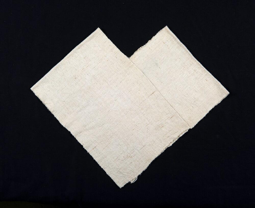 Witte schouder- en borstdoek