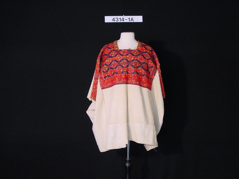 Katoenen blouse met kleurig boorsuursel van een vrouwenkostuum