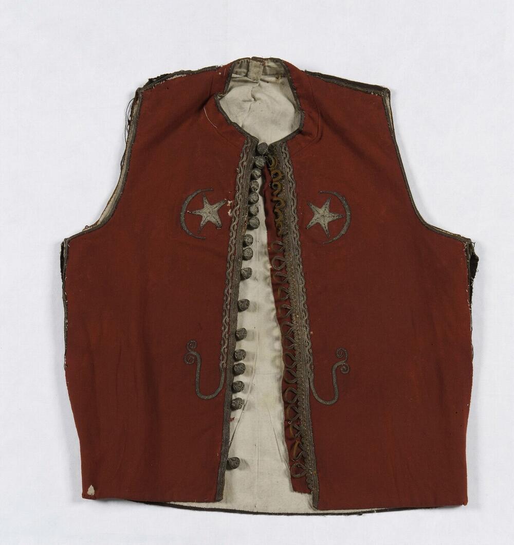 Flanellen vest met gouddraad versierd