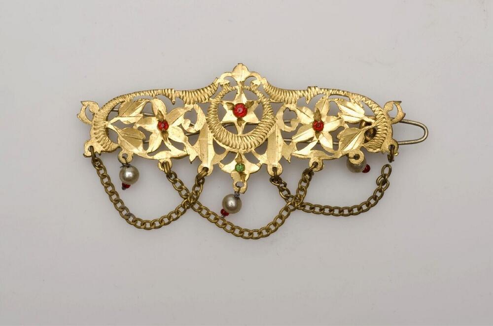 Moderne goudkleurige haarclip
