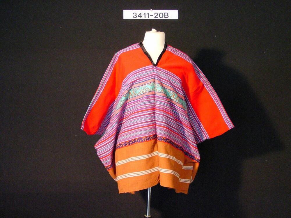Katoenen blouse met veelkleurig bovenstuk, onderdeel van een vrouwenkostuum