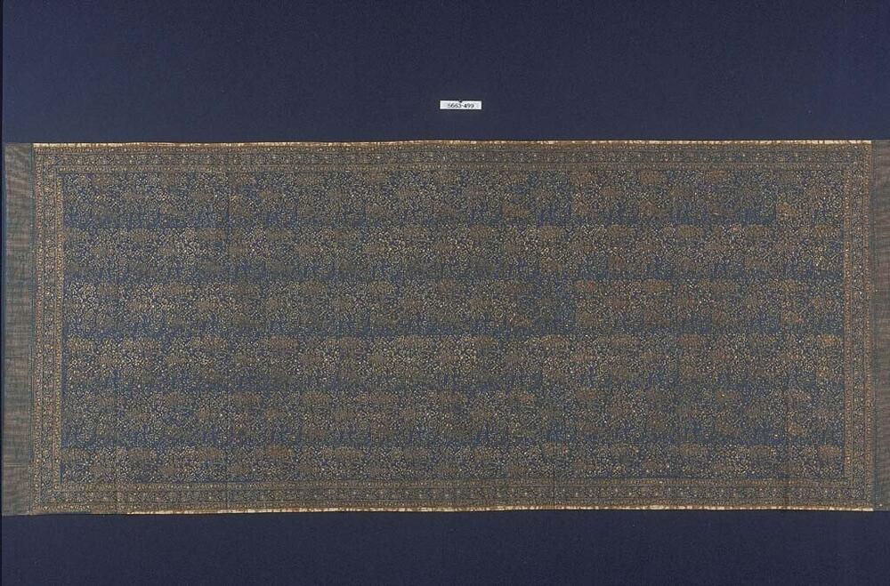 Katoenen schouderdoek, voornamelijk blauw met vleugelmotieven