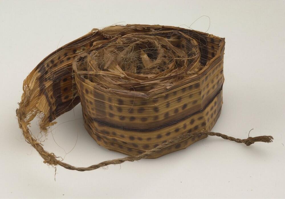 Upper arm decoration made of palm leaf