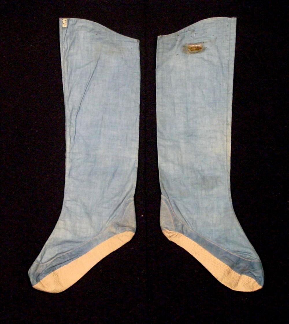 Paar kousen van blauw katoen met zool