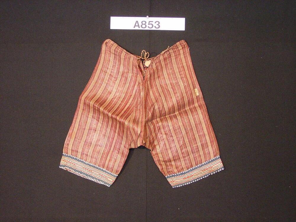 Broek van vezelweefsel versierd met glaskraaltjes