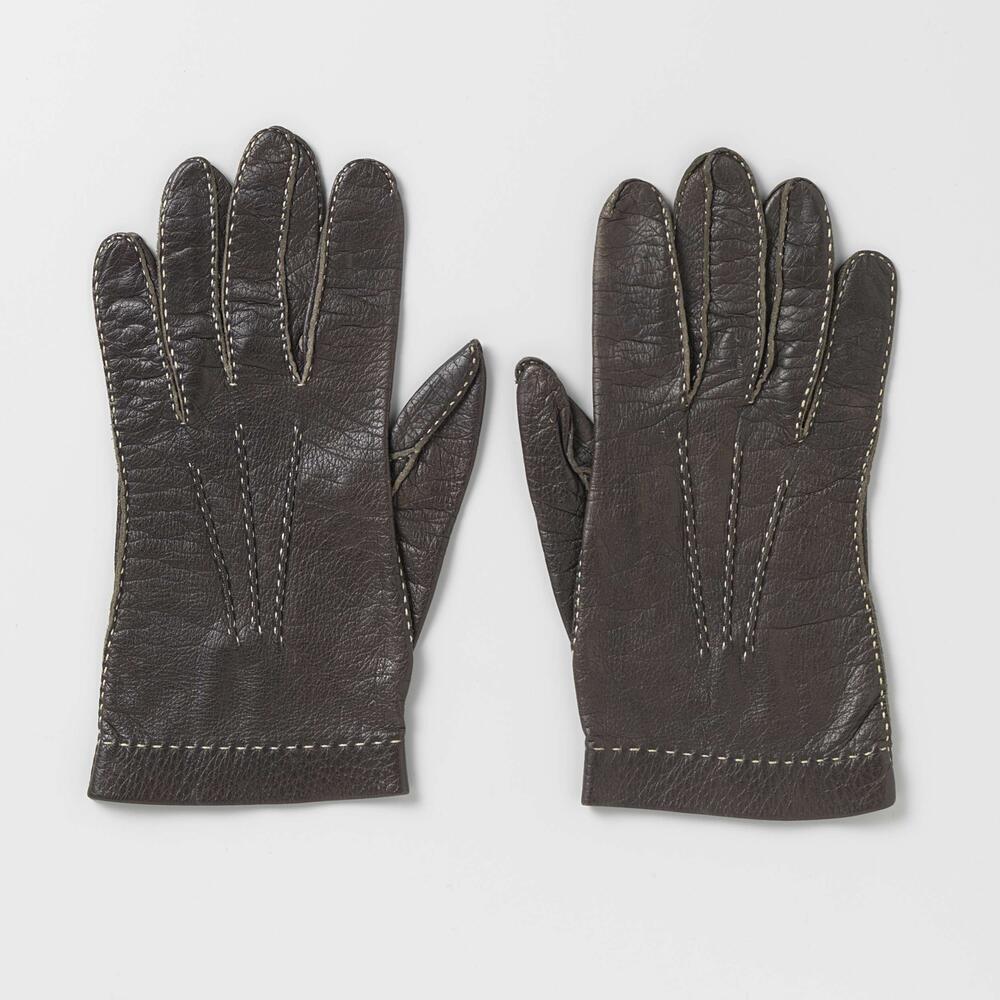 Handschoen van zwart leer met wit stiksel