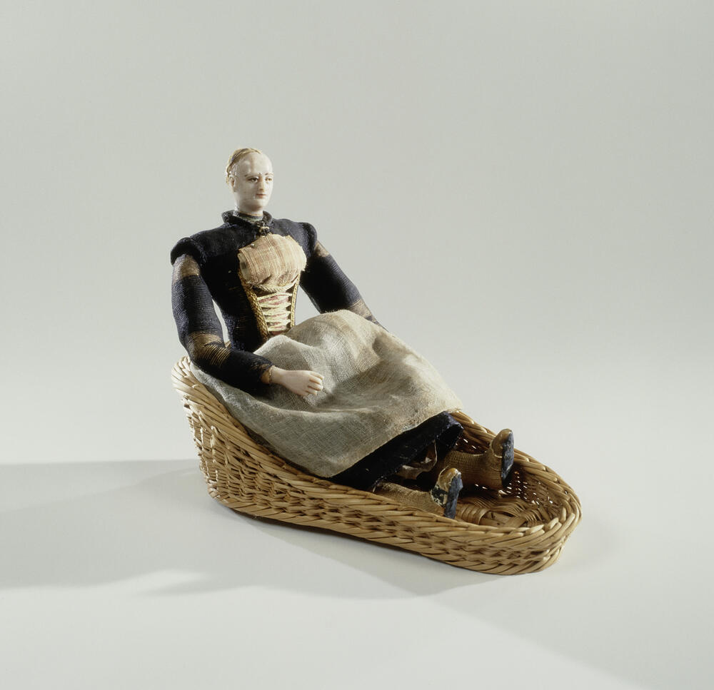 Fragment van poppenkleding