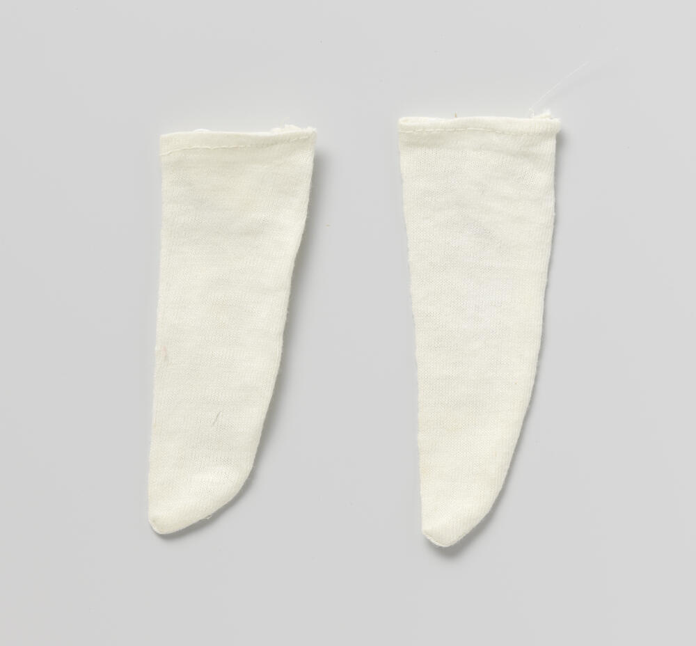 Kous, lang, van witte tricot
