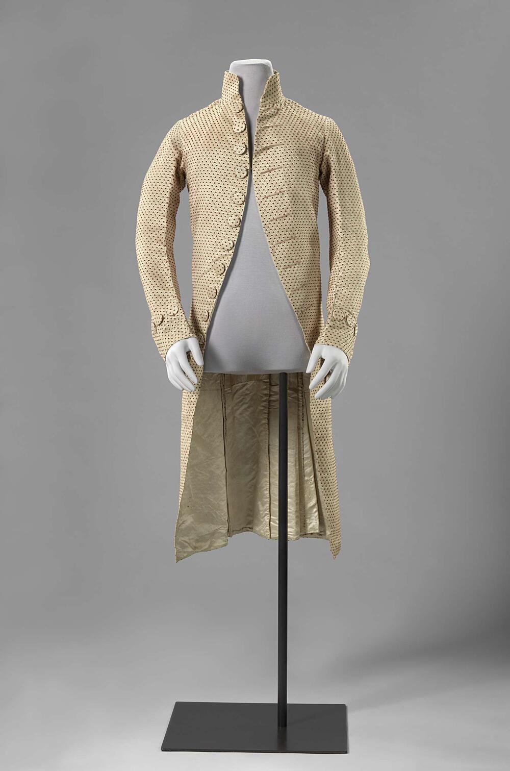 Coat with dotted pattern