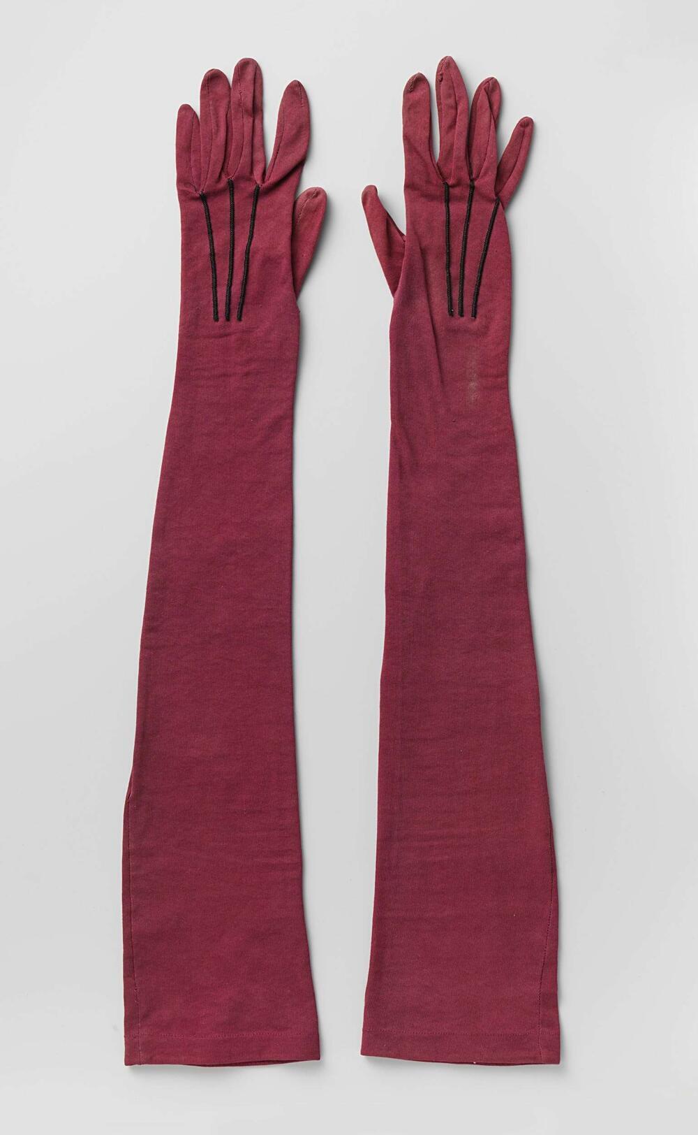 Handschoen van donkerrode katoenen tricot