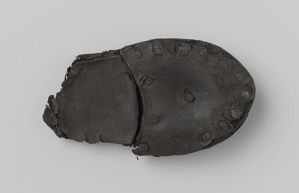 Fragment schoenzool met hak uit het wrak van de Oost-Indiëvaarder Hollandia