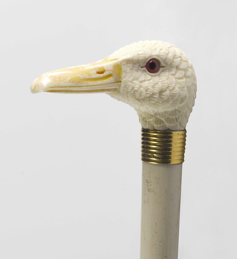 Parasol met knop in de vorm van een eendenkop