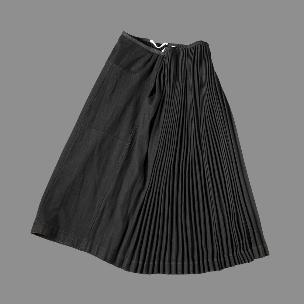 Plooirok, geplooide skort