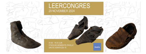 campagnebeeld leercongres met oude middeleeuwse leren schoeisel