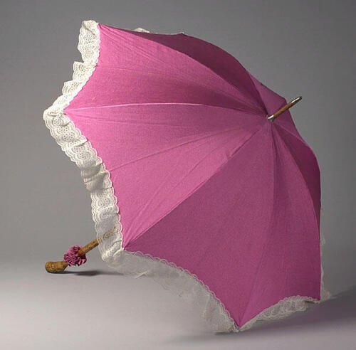 Parasol gedragen door Magda Janssens in Flora Tosca